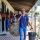Aspiring young Jockey from the South African Jockey Academy, Kaidan Brewer, getting ready to feed horses.